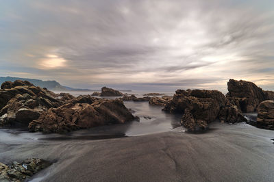 Scenic view of sea against sky during sunset