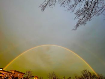 Low angle view of rainbow against sky