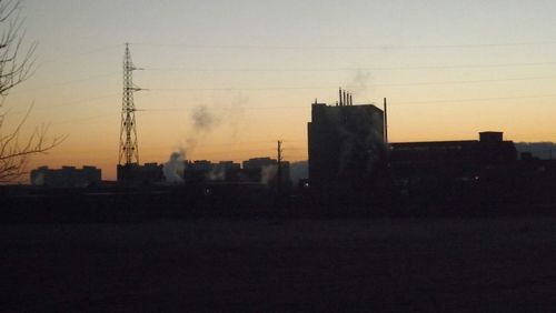 Silhouette of buildings at sunset