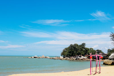 Scenic view of beach against sky