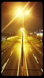 Street light on road at night