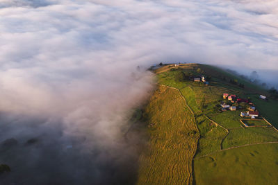 Aerial view of mountain by fog