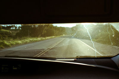 Road seen through car window