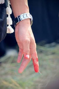 Close-up of woman holding hands