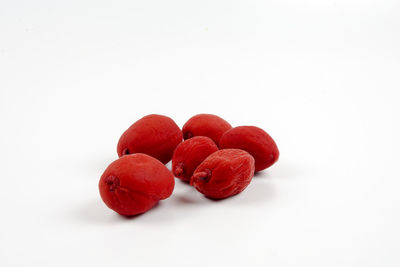 Close-up of strawberries against white background