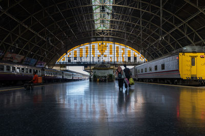 People at railroad station