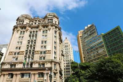 Low angle view of buildings against sky in sao paulo, brazil