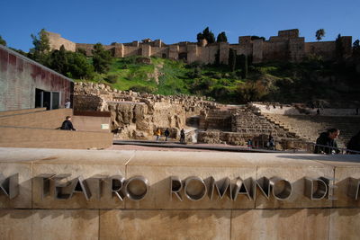 Group of people in front of fort