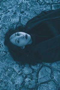 High angle portrait of woman lying down