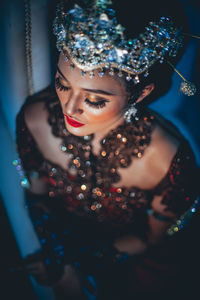 Portrait of young woman looking away