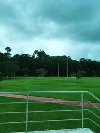 Scenic view of soccer field against sky