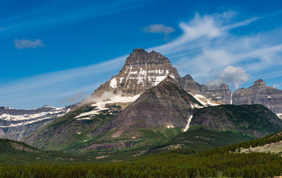 View of mountain range against cloudy sky