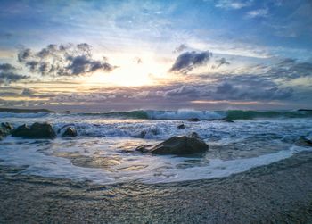 Scenic view of sea against sky during sunset