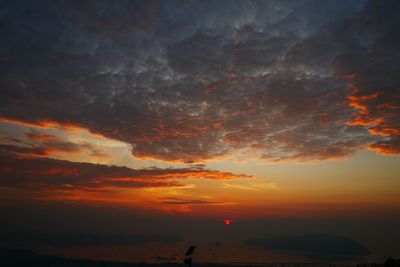 Scenic view of dramatic sky during sunset