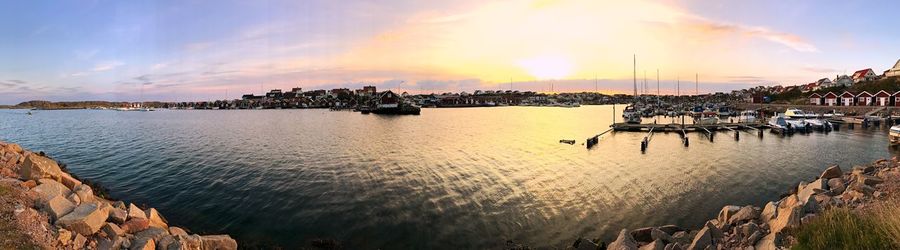 Panoramic view of sea against sky at sunset