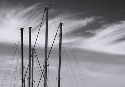 Low angle view of sailboat in sea against sky