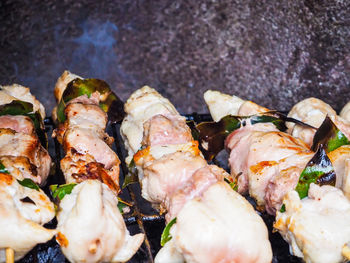 High angle view of fish on barbecue grill