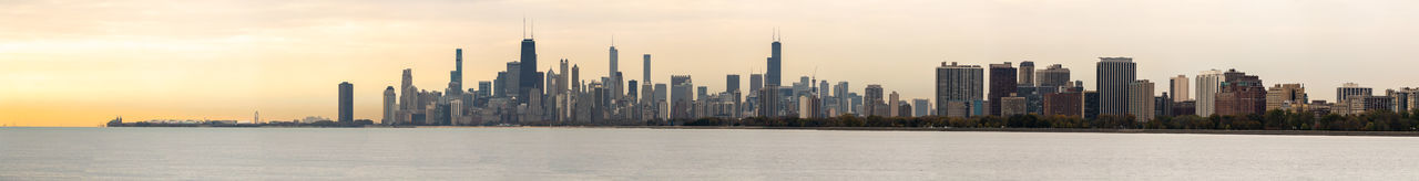 Chicago panoramic skyline view with lake michigan below.