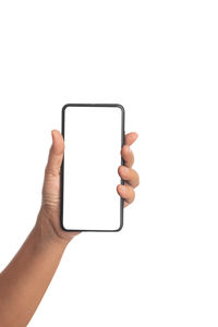 Hand holding smart phone over white background