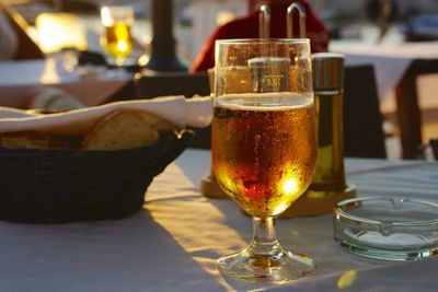 Close-up of beer glass on table