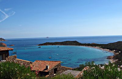 High angle view of sea against blue sky