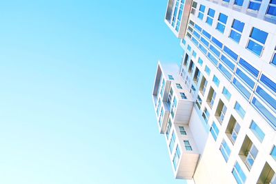 Low angle view of buildings against clear sky