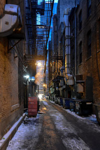 Narrow alley with buildings in background