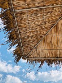 Low angle view of roof against sky