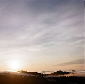 Scenic view of silhouette landscape against sky during sunset