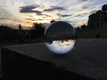 Reflection of crystal ball on water