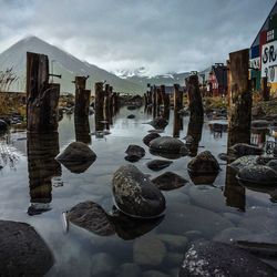 Reflection of rocks in sea