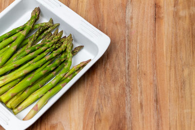 High angle view of vegetables in plate on table