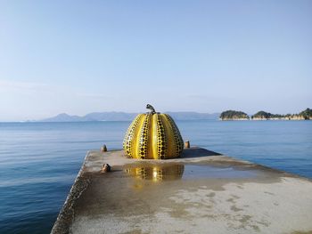 Panoramic view of temple by sea against sky