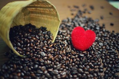 Close-up of heart shape made of coffee beans