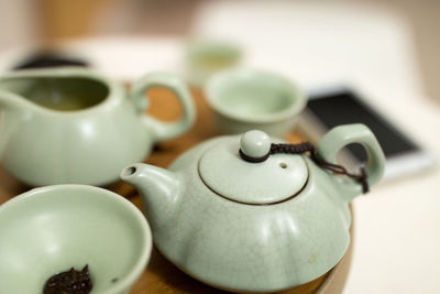 High angle view of teapot on table at home