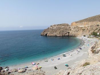 Scenic view of beach against clear sky