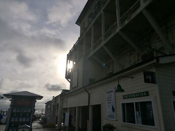 Low angle view of houses against sky