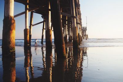 Pier on sea against sky