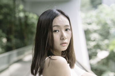 Close-up portrait of young woman