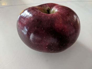 High angle view of apple on table