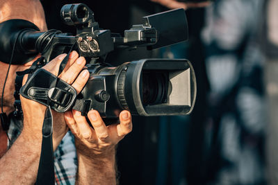 Television cameras at a press conference outdoors