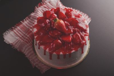 High angle view of strawberry cake on table