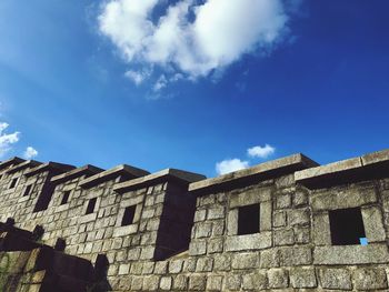 Low angle view of old building against sky