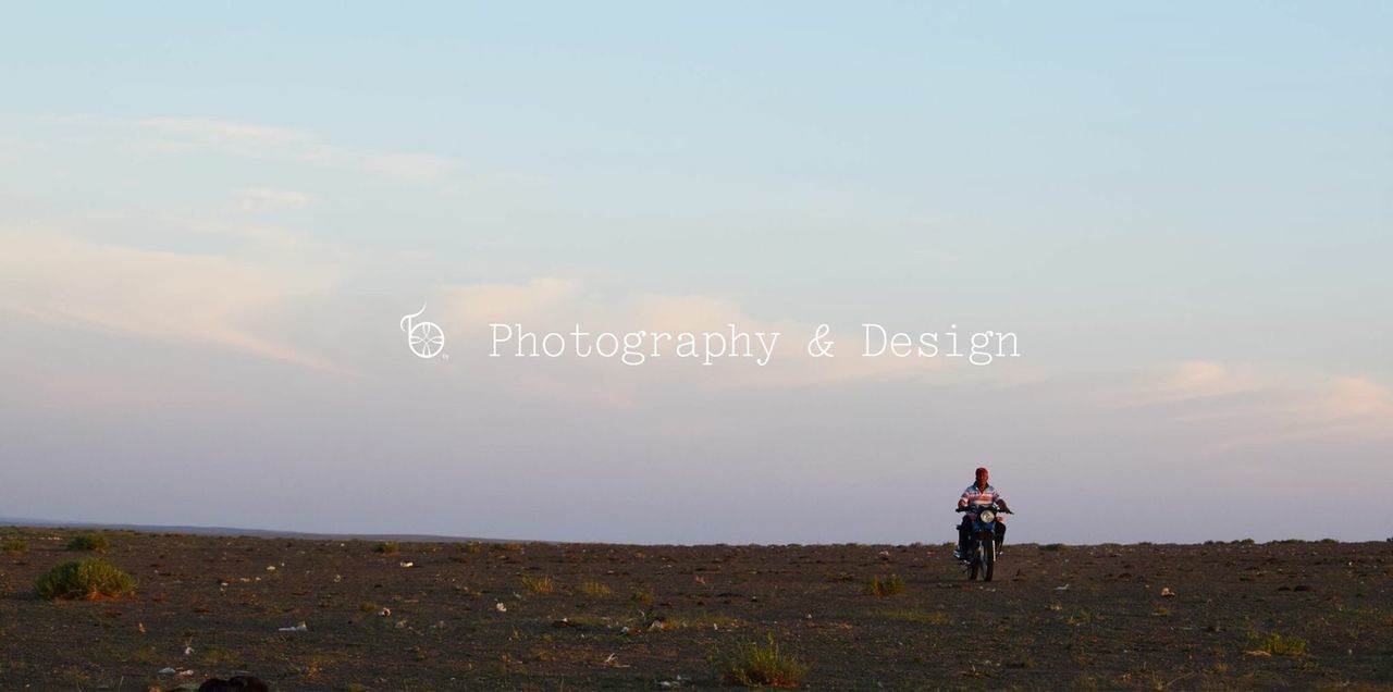 text, outdoors, landscape, one person, cloud - sky, full length, real people, sky, nature, day, standing, beauty in nature, scenics, adventure, mountain, men, people