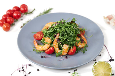 High angle view of salad in plate on table