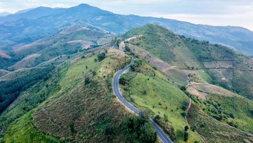 Aerial landscape view mountain paths rural road between the city at doi chang chiang rai thailand