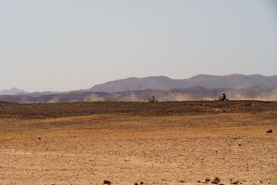 Scenic view of desert against sky