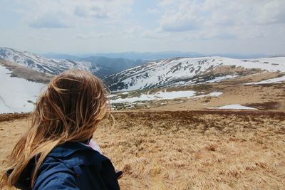 Rear view of woman on mountain