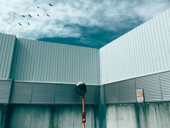 Low angle view of modern building against sky