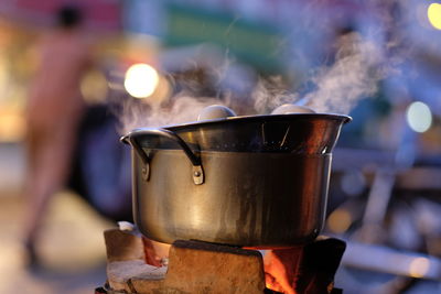 Close-up of cooking utensil on stove